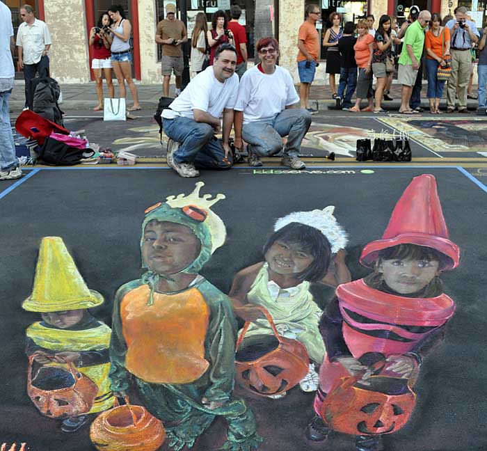 Wayne and Cheryl pose with the finished painting