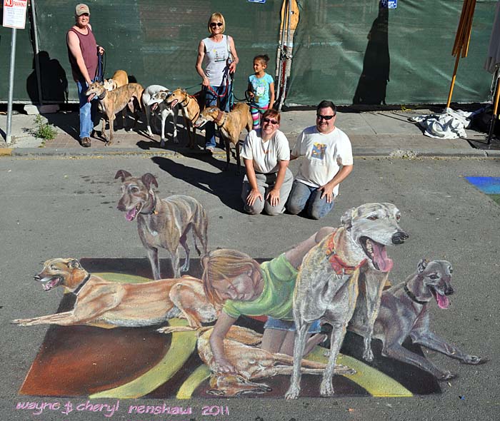 The finished painting with a pack of real greyhounds