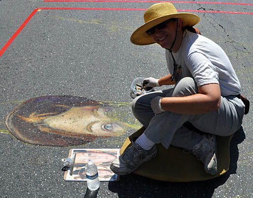 Cheryl paints the camper's face