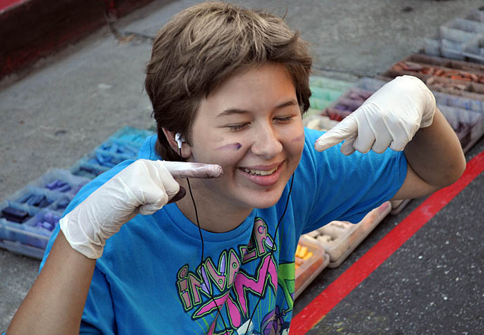 Alex points out her painted face