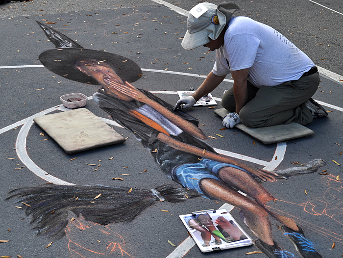 Wayne paints Alex' shirt