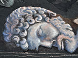 fallen head of statue of Hadrian